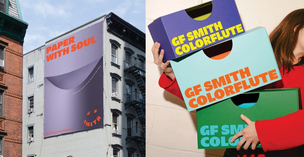 GF Smith's colourful rebrand shown on a purple billboard reading "PAPER WITH SOUL" and stacked bright boxes labeled "GF SMITH COLORFLUTE."