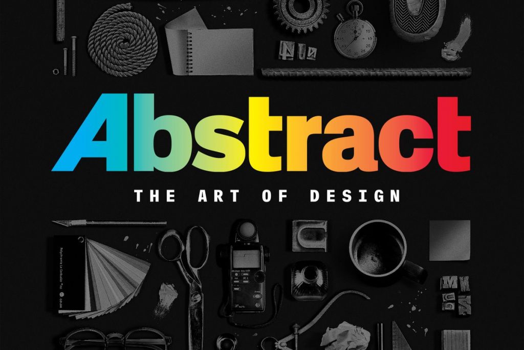 A title screen depicting the word "abstract" in rainbow colours against a dark background with various miscellaneous items on it