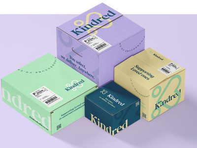 The image shows four boxes in pastel tones of lavender, mint green, beige, and navy blue. Each box features the Kindred logo—a stylized heart forming the letter “K”. The design feels soft, friendly, and community-oriented, reflecting the brand’s focus on compassion and connection.