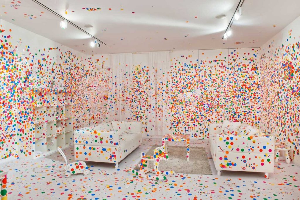 White room with multicoloured dots on it